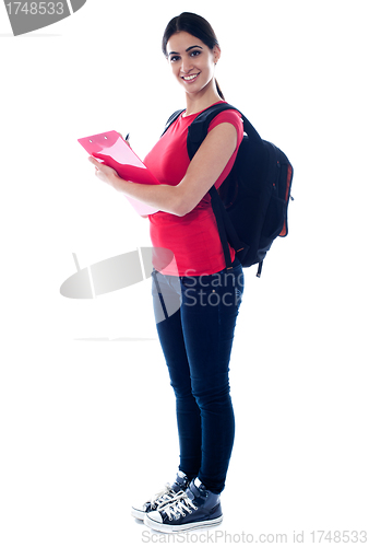 Image of Attractive young girl. Full length portrait