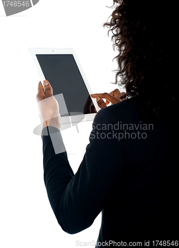 Image of Cropped image of a woman using wireless pc