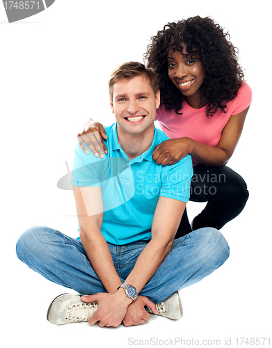 Image of Love couple sitting on floor