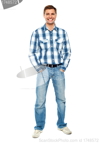 Image of Full length portrait of fashionable young man