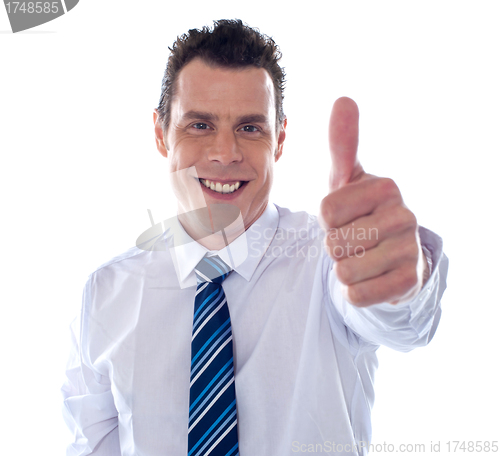 Image of Corporate man showing thumbs up