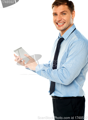 Image of Businessman with electronic touch pad tablet