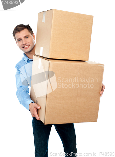 Image of Casual man with boxes