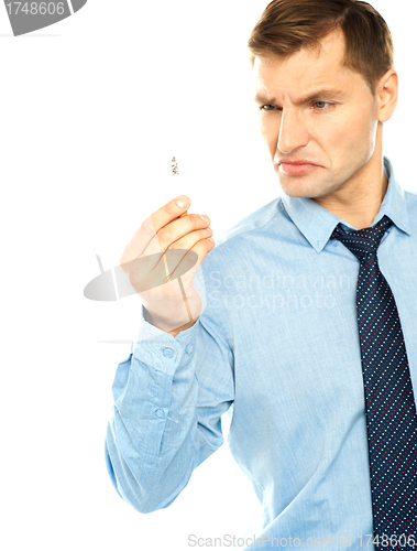 Image of Angry smoker staring at cigarette