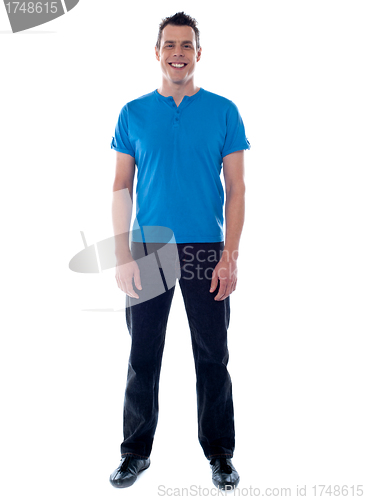 Image of Full length portrait of casual young man