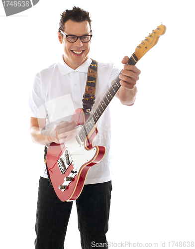 Image of Man with guitar enjoying music