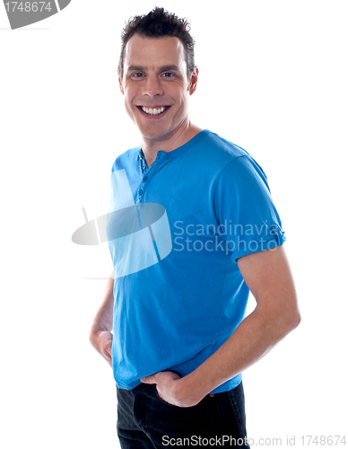 Image of Trendy young guy posing in style