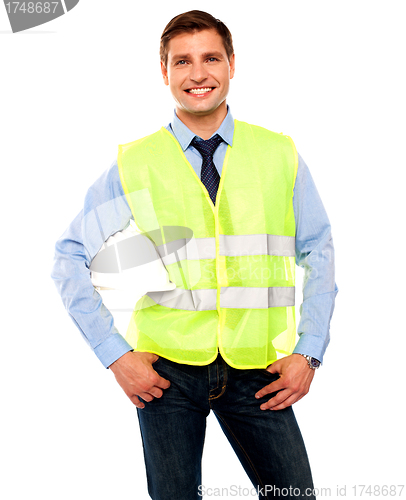 Image of Male architect posing with hard hat