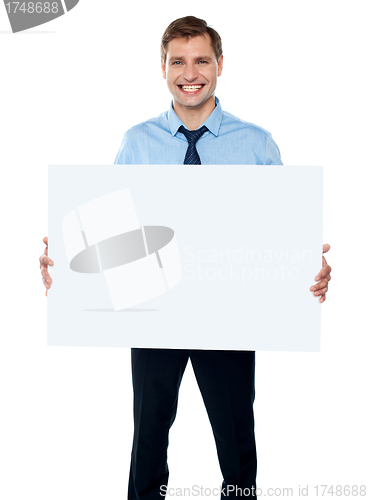 Image of Corporate man showing billboard banner