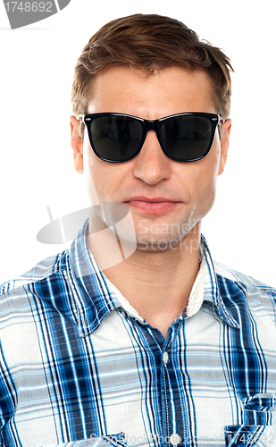 Image of Handsome casual man wearing goggles