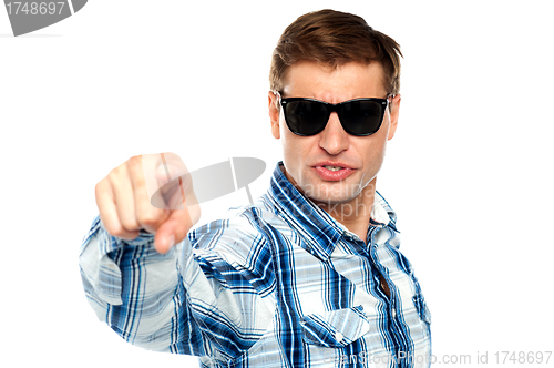 Image of Cool fashionable guy pointing at you