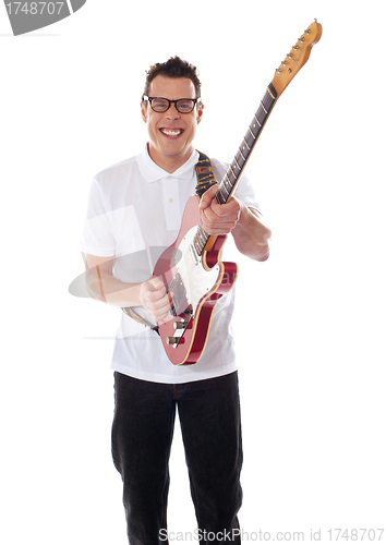 Image of Young guitarist playing guitar