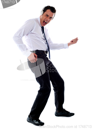 Image of Business representative enjoying music