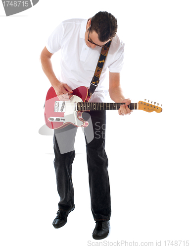 Image of Casual man with guitar looking down