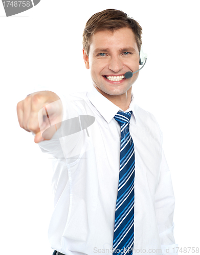 Image of Male executive pointing at you