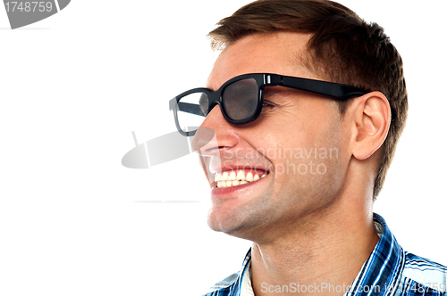 Image of Cheerful adult male having a good laugh