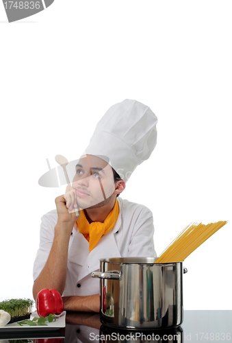 Image of Chef daydreaming while making spaghetti