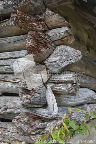 Image of Corner of an old log house.