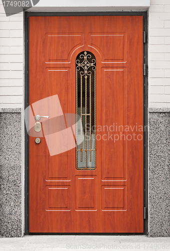 Image of Brown front door - entrance to the building