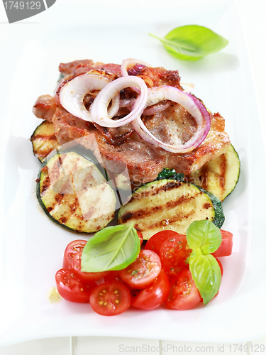 Image of Pan-fried pork steak  with grilled vegetable