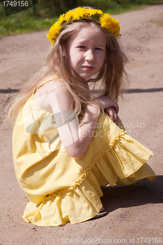 Image of little girl in yellow