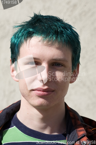 Image of teenager with green hair