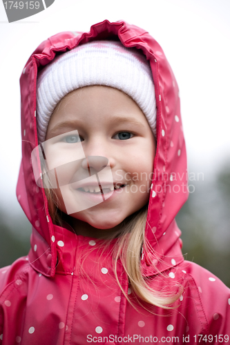 Image of little girl without one tooth