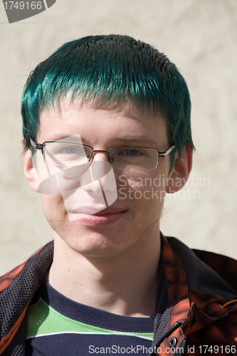 Image of portrait of teenager with green hair