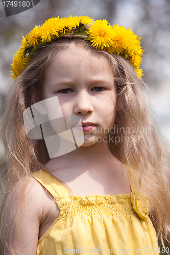 Image of little girl in dandelion wreath