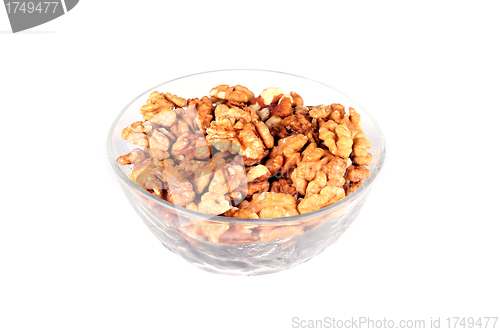 Image of Walnuts in a plate on a white background