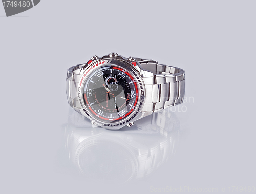 Image of Watch on a grey background with reflection