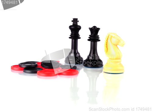 Image of Chess and Checkers whith reflection on a white background