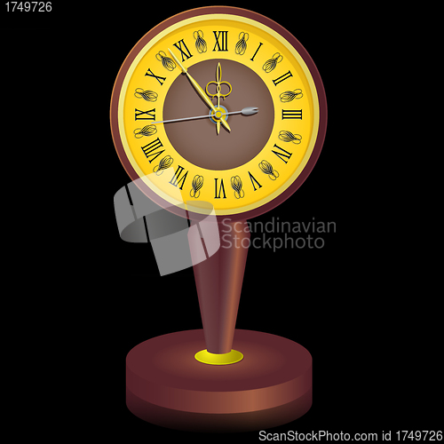 Image of The vintage  clock shortly before midnight. 