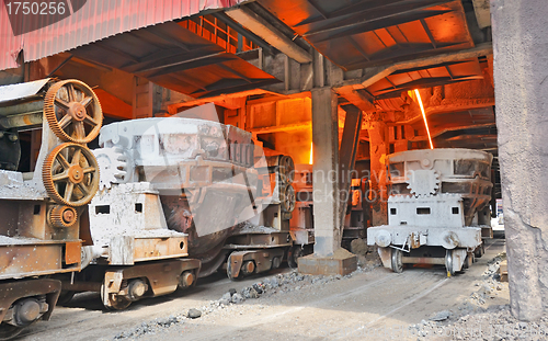 Image of steel buckets to transport the molten metal