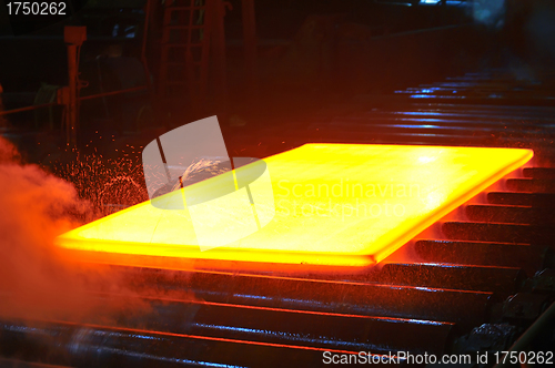 Image of hot steel on conveyor 