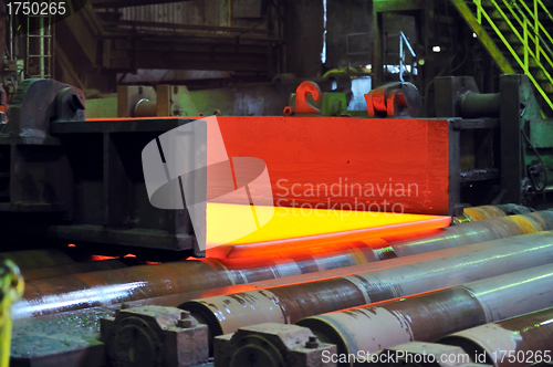 Image of hot steel on conveyor 