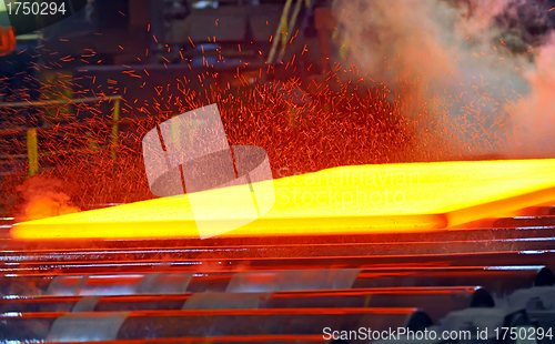 Image of hot steel on conveyor 