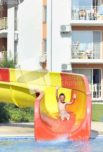 Image of boy on a waterslide