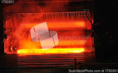 Image of hot steel on conveyor