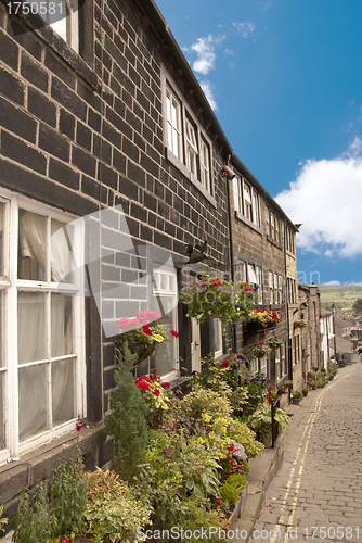 Image of Old Mill Cottages and Flowers