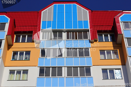 Image of The inhabited high house against the blue sky