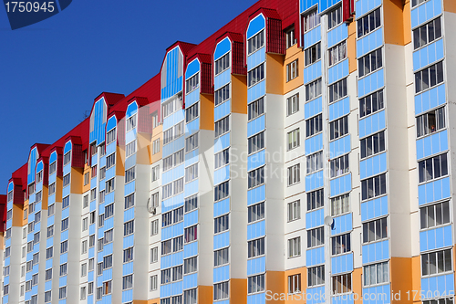 Image of The inhabited high house against the blue sky