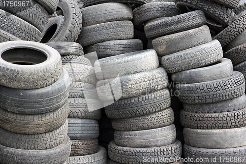 Image of background with old tires on each other