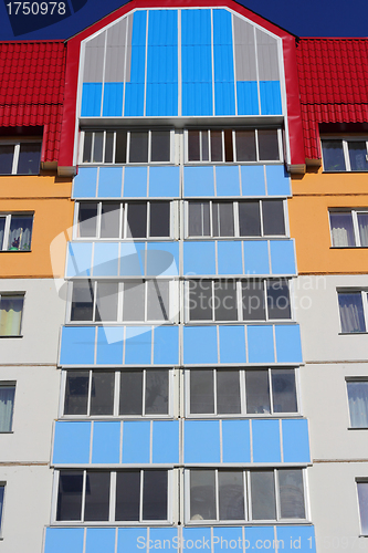 Image of The inhabited high house against the blue sky