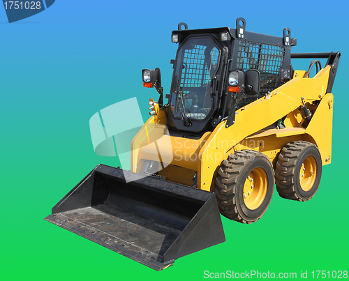 Image of The yellow truck with a scraper to lift cargo.
