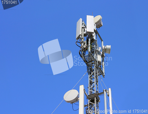 Image of Cellular antenna  against blue sky