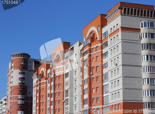 Image of The inhabited high house against the blue sky
