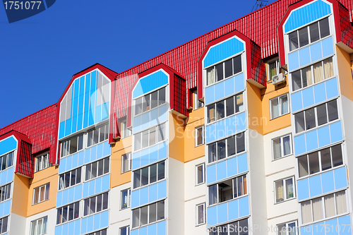 Image of The inhabited high house against the blue sky
