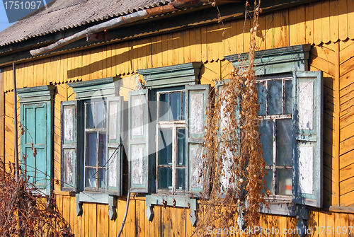 Image of old dirty windows on old  wall