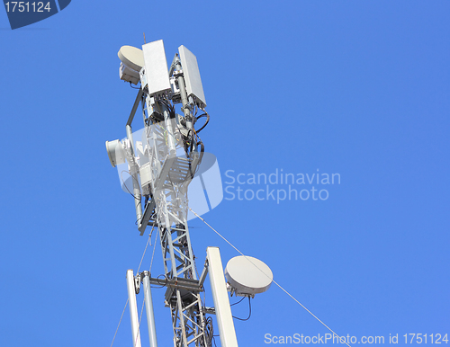 Image of Cellular antenna  against blue sky